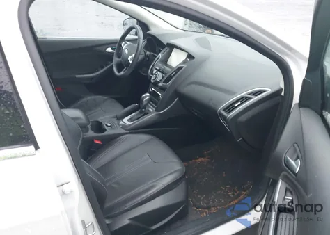 2014 Ford Focus Titanium from USA, damaged, VIN 1FADP3N25EL375578